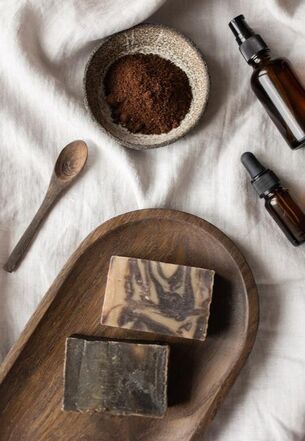 Homemade soap, essential oils being made in a wooden bowl | Advanced Therapy institute of Touch knows the correct way of working with Essential Oils.