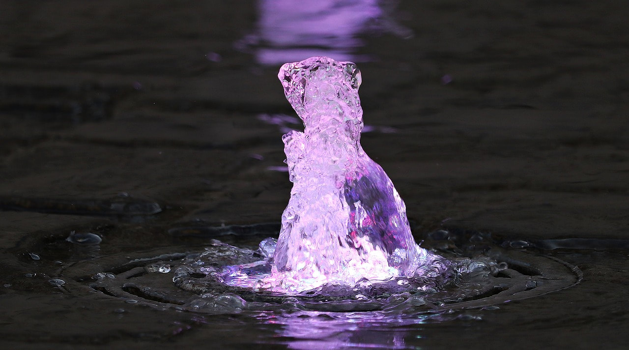Violet Light Shining Through Water. Learn Basic Light & Laser Therapy | Advanced Therapy Institute of Touch, Colorado Springs